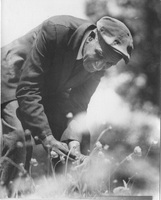 George Washington Carver Picking Flowers