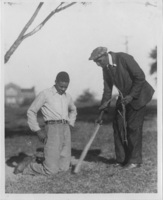 George Washington Carver and a young male individual