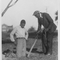 George Washington Carver and a young male individual